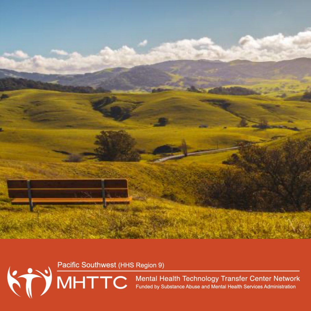 PS MHTTC image of an empty bench in front of a beautiful green hilly area with clouds off in the distance