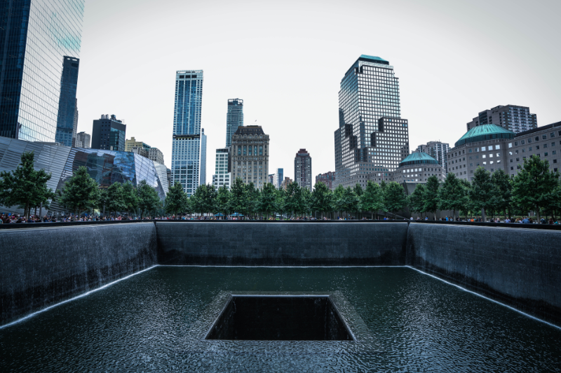 The 9/11 Memorial in New York. Photo via Unsplash by Axel Houmadi.