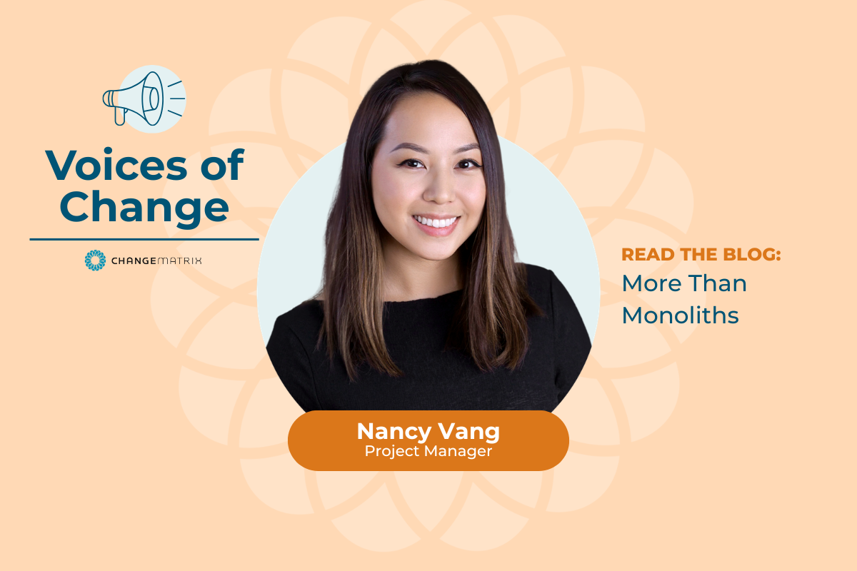 A promotional graphic for Change Matrix's 'Voices of Change' blog series on a warm peach background with a subtle floral watermark pattern. On the left, a megaphone icon appears above the bold navy text 'Voices of Change' with the Change Matrix logo beneath it. In the center, Nancy Vang is shown in a circular portrait frame, smiling and wearing a black top, with her name and title 'Project Manager' displayed in a burnt orange banner below her photo. To the right, text reads 'READ THE BLOG: More Than Monoliths,' inviting viewers to engage with her featured article.