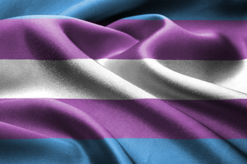 A closeup of the transgender flag with folds in the material.